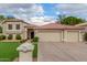 Charming home featuring a three car garage, meticulously landscaped front yard at 2321 N Glenview --, Mesa, AZ 85213