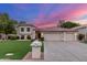 Charming two-story home featuring a tile roof, well-manicured lawn and three-car garage at 2321 N Glenview --, Mesa, AZ 85213