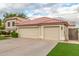 Close up of a three car garage, mature landscaping, and neutral color palette at 2321 N Glenview --, Mesa, AZ 85213