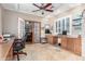 Large home office featuring custom cabinets, a tile floor and outdoor views at 2321 N Glenview --, Mesa, AZ 85213