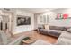 Inviting living room featuring media center, comfortable seating and tile flooring at 2321 N Glenview --, Mesa, AZ 85213