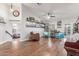 Bright living room with hardwood floors, vaulted ceilings, and stylish accent chairs at 2321 N Glenview --, Mesa, AZ 85213