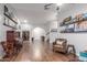 Spacious living room with hardwood flooring, and natural light with open concept to foyer and stairwell at 2321 N Glenview --, Mesa, AZ 85213