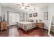 Comfortable main bedroom with dark wood floors and modern decor at 2321 N Glenview --, Mesa, AZ 85213