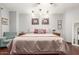Comfortable main bedroom with dark wood floors and modern decor at 2321 N Glenview --, Mesa, AZ 85213