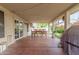 Covered patio with string lights and ample seating, ideal for outdoor entertaining and relaxed gatherings at 2321 N Glenview --, Mesa, AZ 85213