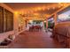Inviting covered patio area with string lights, ideal for outdoor dining and entertaining at 2321 N Glenview --, Mesa, AZ 85213