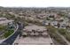 Aerial view of the neighborhood showcasing the roof lines of multiple units at 29120 N 22Nd Ave # 205, Phoenix, AZ 85085