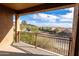 Balcony view showcasing desert scenery and neighborhood homes at 29120 N 22Nd Ave # 205, Phoenix, AZ 85085