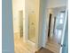 Bright bathroom features a glass-enclosed shower and a separate toilet room at 29120 N 22Nd Ave # 205, Phoenix, AZ 85085