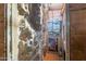 Indoor rock climbing wall and large window showing community park, offering a unique fitness experience at 29120 N 22Nd Ave # 205, Phoenix, AZ 85085