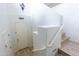 Bright entryway featuring stairs, white walls and wood flooring at 29120 N 22Nd Ave # 205, Phoenix, AZ 85085