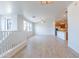 Open concept living area with wood-style floors connecting living room to the kitchen at 29120 N 22Nd Ave # 205, Phoenix, AZ 85085