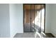 Screened patio with sliding glass door leading to the home's interior at 29120 N 22Nd Ave # 205, Phoenix, AZ 85085