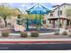 Community playground featuring slides, climbing structures and shade at 29120 N 22Nd Ave # 205, Phoenix, AZ 85085