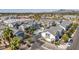 Stunning aerial view of a well-planned community featuring modern townhomes, a sparkling pool, and lush landscaping, offering a vibrant lifestyle at 3200 N 39Th St # 4, Phoenix, AZ 85018