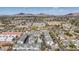 High-angle view of a neighborhood featuring modern townhomes with community pool and mountain views at 3200 N 39Th St # 4, Phoenix, AZ 85018