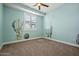 Bright bedroom with painted murals, neutral carpet, and plantation shutters at 3200 N 39Th St # 4, Phoenix, AZ 85018