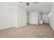 Large carpeted bedroom boasts sconce lighting and plenty of open space at 3200 N 39Th St # 4, Phoenix, AZ 85018
