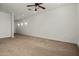 Spacious carpeted bedroom has ample room and unique sconce lighting for a warm ambiance at 3200 N 39Th St # 4, Phoenix, AZ 85018