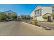 View of the gated community entrance with modern townhomes and manicured landscaping at 3200 N 39Th St # 4, Phoenix, AZ 85018