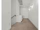 Hallway with neutral colored carpet, white walls, and modern lighting fixtures at 3200 N 39Th St # 4, Phoenix, AZ 85018
