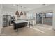 Bright kitchen features a large island with quartz countertop, stainless appliances, and access to the backyard at 3200 N 39Th St # 4, Phoenix, AZ 85018