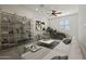 Stylish living room with high ceilings, a ceiling fan, and lots of natural light at 3200 N 39Th St # 4, Phoenix, AZ 85018