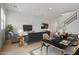 Living space with a dining area, modern decor, and a staircase leading to the upper level at 3200 N 39Th St # 4, Phoenix, AZ 85018