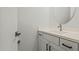 Elegant powder room featuring modern sink and a decorative mirror at 3200 N 39Th St # 4, Phoenix, AZ 85018