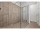 Modern shower design with a glass partition and stylish neutral-colored tiling at 3200 N 39Th St # 4, Phoenix, AZ 85018