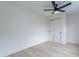 Bedroom featuring light wood floors, ceiling fan, and closet at 3207 W Royal Palm Rd, Phoenix, AZ 85051