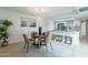 Cozy dining area adjacent to the kitchen, showcasing counter seating and modern decor at 3207 W Royal Palm Rd, Phoenix, AZ 85051