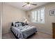 Comfortable bedroom featuring neutral walls, ceiling fan and carpeted floors at 3285 E Phelps St, Gilbert, AZ 85295
