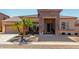 Charming home featuring a decorative stone facade, a welcoming front porch with seating, and desert landscaping at 3285 E Phelps St, Gilbert, AZ 85295