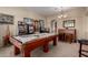 Entertaining game room featuring a pool table, and a built-in bar at 3285 E Phelps St, Gilbert, AZ 85295