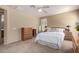 Serene main bedroom featuring a plush bed, coordinating nightstands, and ample natural light from shuttered windows at 3285 E Phelps St, Gilbert, AZ 85295
