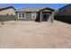 The backyard features a covered patio, potential for outdoor living and entertaining at 36905 W Mattino Ln, Maricopa, AZ 85138