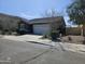 Inviting single-story home with a well-maintained yard, two car garage and desert landscaping at 36905 W Mattino Ln, Maricopa, AZ 85138