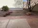 Cozy backyard with minimal landscaping, a brick patio, and privacy wall at 3758 E Ironwood Dr, Phoenix, AZ 85044