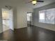 Bright bedroom with sliding glass closet doors and wood look tile flooring at 3758 E Ironwood Dr, Phoenix, AZ 85044