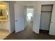 Bright, carpeted bedroom with a closet and an ensuite bathroom at 3758 E Ironwood Dr, Phoenix, AZ 85044