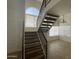 Bright entryway with statement windows, staircase, and entry to the living area at 3758 E Ironwood Dr, Phoenix, AZ 85044