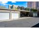 Detached garages with secure parking, featuring bright white garage doors and convenient access at 387 N 2Nd Ave # 2E, Phoenix, AZ 85003