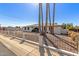 Charming single-story home featuring an arched entryway, mature palms, and low decorative fence at 3901 W Davidson Ln, Phoenix, AZ 85051