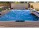 Inviting hot tub filled with bubbly blue water and modern digital controls at 3901 W Davidson Ln, Phoenix, AZ 85051