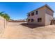 Home exterior with an expansive backyard and a covered patio area at 41800 W Chambers Ct, Maricopa, AZ 85138