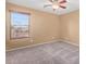 Bedroom with carpet, ceiling fan, and a window with blinds at 41800 W Chambers Ct, Maricopa, AZ 85138