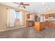 Well-appointed kitchen featuring stainless steel appliances, granite countertops, and ample storage space at 41800 W Chambers Ct, Maricopa, AZ 85138