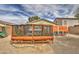 Backyard featuring a raised garden bed, gravel, and privacy fence at 44715 W Paitilla Ln, Maricopa, AZ 85139